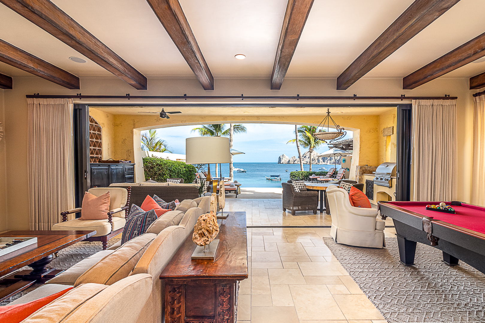 Open concept living room with ocean views at Villa Anais
