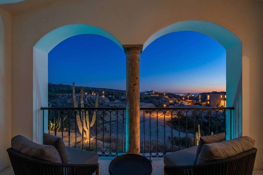 Arched terrace with desert views at dusk, Rancho San Lucas Villa 10