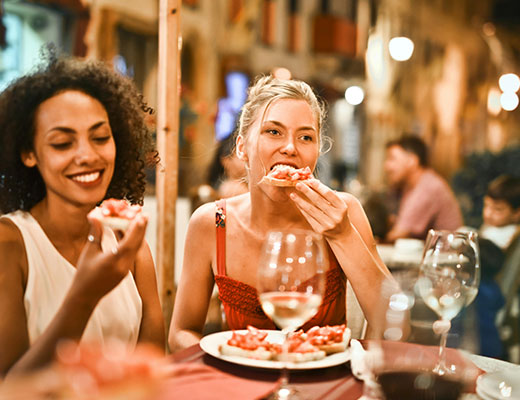 Two women eating in a restaurant