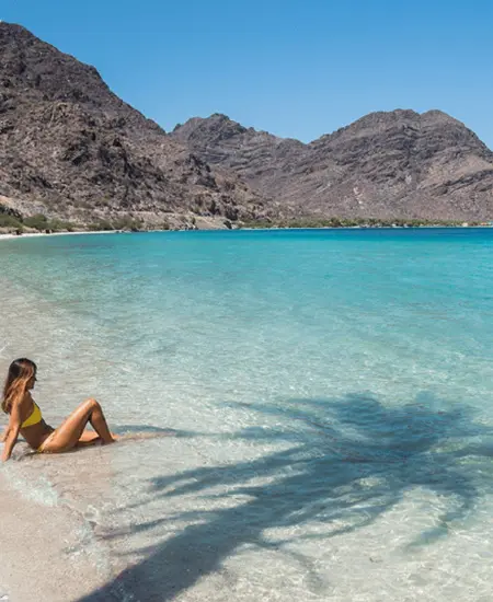 woman enjoying the beach woman enjoying the beach